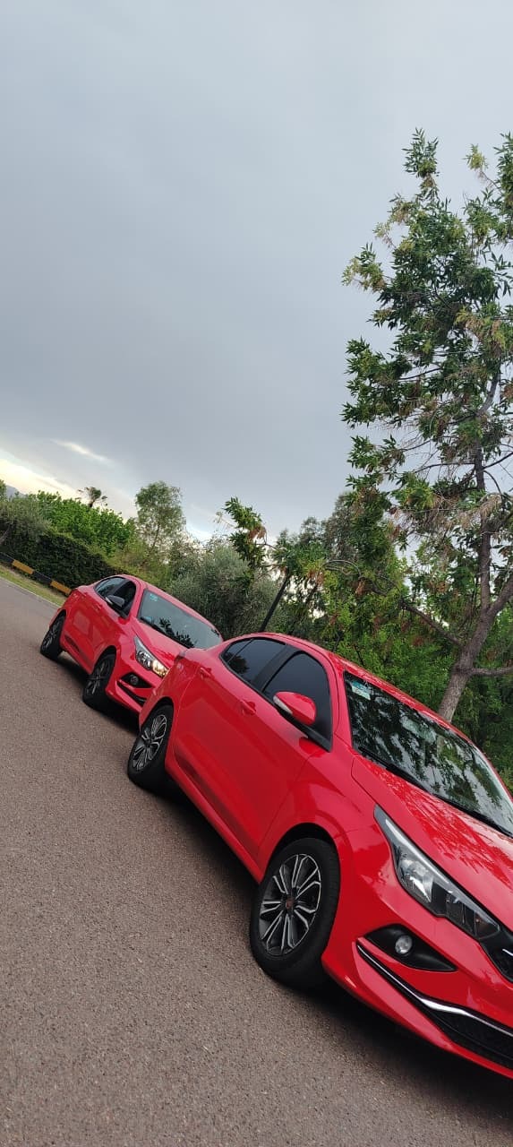 Fiat Cronos rojos de Rama Tours